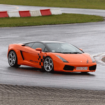 Driving behind the wheel of a Lamborghini Gallardo on the track (1 lap)