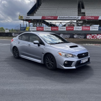 Driving behind the wheel of a Subaru Impreza on the track (2 laps)